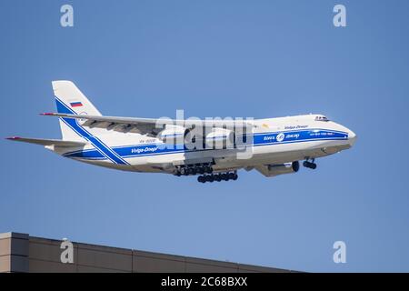 July 5, 2020 Sunnyvale / CA / USA - Antonov An-124 Ruslan cargo airplane, operated by Volga-Dnepr Airlines, preparing for landing at Moffett Airfield Stock Photo