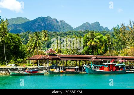 Langkawi, officially known as Langkawi, the Jewel of Kedah, is a district and an archipelago of 99 islands in the Andaman Sea some 30 km off the mainl Stock Photo