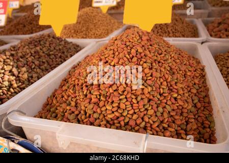 Dried cat and dog food in boxes. It is sold in the pet store. Close up. Stock Photo