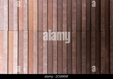 Irregular orange brick arrangement. brickwall. Stock Photo