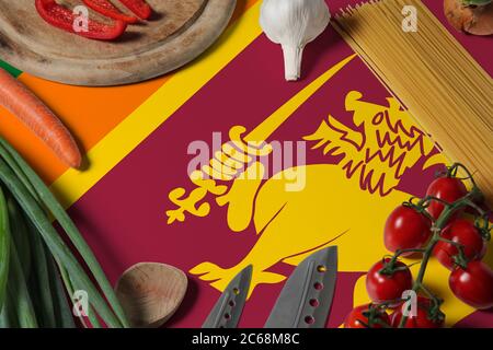 Sri Lanka flag on fresh vegetables and knife concept wooden table. Cooking concept with preparing background theme. Stock Photo