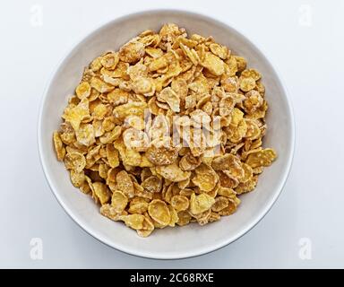 Cornflakes in a bowl isolated on white Stock Photo