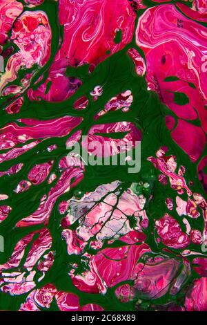 Combine oil paints. Wet colored oils mixed from the top view Stock Photo