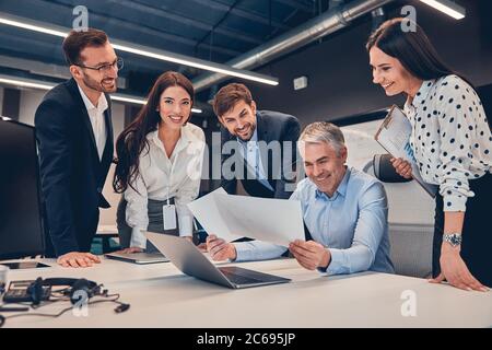 Business people developing strategy in modern office Stock Photo