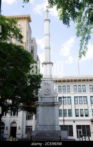 A Confederate monument in Augusta, Georgia, with statues of soldiers and the words Deo Vindice (With God As Our Defender) engraved on the front. There Stock Photo