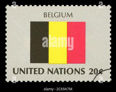 BELGIUM - Postage Stamp of Belgium national flag, Series of United Nations, circa 1984. Isolated on black background. Stock Photo