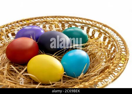Multi-colored easter paint eggs in pottle close up. Festive easter concept. Stock Photo