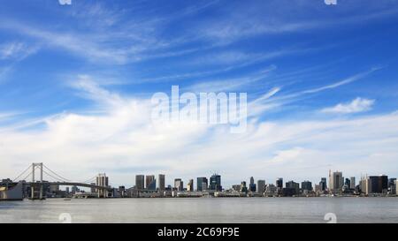 Panoramic view of the Tokyo Bay area overlooking the Rainbow Bridge and Tokyo Tower Stock Photo