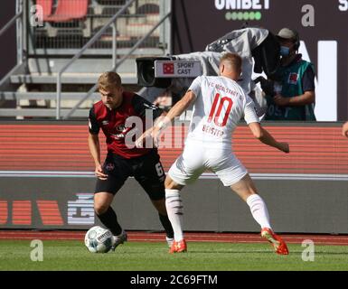 Nuremberg, Deutschland. 07th July, 2020. firo Football: Football: 07.07.2020 Relegation game relegation 2020 to 2.Bundesliga FC Nuremberg - FC Ingolstadt 04 2: 0 first leg duels, Tim Handwerker, versus, Beister Maximilian DFB/DFL regulations prohibit any use of photographs as image sequences and/or quasi -video., Bernd Muller/pool/via/firosportphoto | usage worldwide Credit: dpa/Alamy Live News Stock Photo