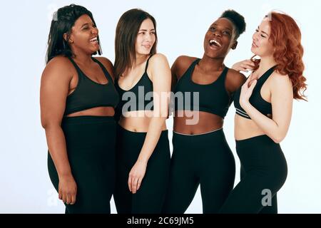 Group of women of different race, figure type and size in