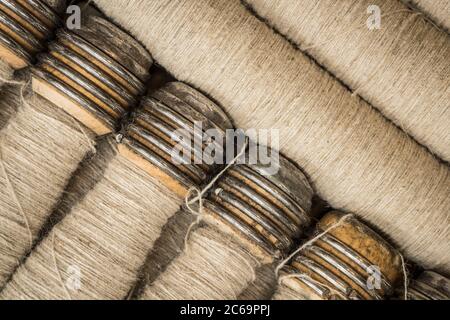 spools with thread for using in a loom Stock Photo