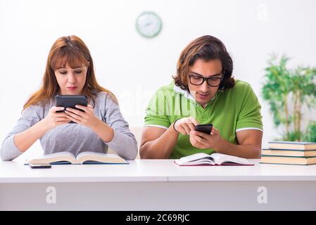 Students in gadget dependency concept Stock Photo