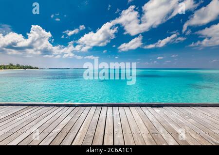 Wooden floor with blue sea and sky background. Summer scenery with horizon and seascape over wooden desk, copy space. Beach landscape background Stock Photo