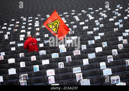 Hamburg, Germany. 08th July, 2020. Employees of the aircraft manufacturer Airbus are gathering outside the factory gates in Hamburg-Finkenwerder for a nationwide day of action against job cuts by the aircraft manufacturer. With the 2000 chairs in front of the main entrance, IG Metall wants to signal how many jobs are to be cut at the site. Credit: Christian Charisius/dpa/Alamy Live News Stock Photo