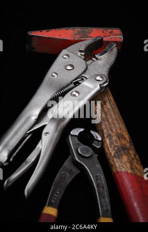 Industrial tools such as French wrenches and a variety of wrenches from a close-up in the form of color and black and white images. Stock Photo