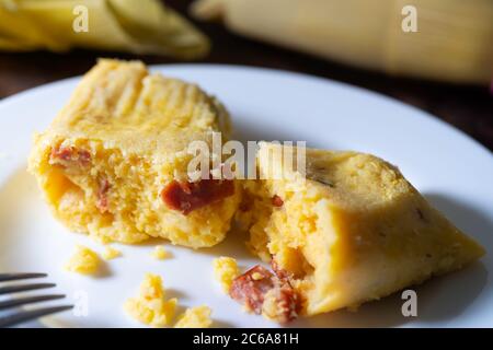 Pamonha with sausages and cheese, traditional Brazilian food Stock Photo