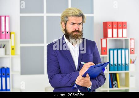 checking the result. businessman hold office folder. business management professional. chief information officer. IT director or CIO. successful crisis manager make notes in documents. Stock Photo