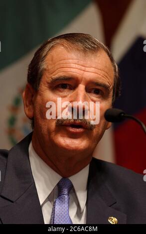 Austin Texas USA, November 6, 2003: Mexico President Vincente Fox speaks at a press conference during a visit to the Texas State Capitol where he and Governor Rick Perry discussed water rights, immigration and other border issues common to Texas and northern Mexico. ©Bob Daemmrich Stock Photo