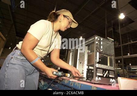 Austin, Texas USA, 13JUL00:  Server manufacturing process at Dell Computer facility in north Austin shows 'picking area' where electronic parts including computer motherboard are installed by a technician on a server platform. ©Bob Daemmrich Stock Photo