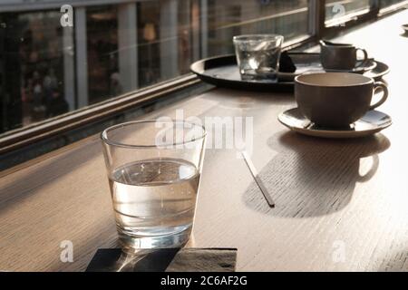 Glass of water ,Coffee shop, London,Uk Stock Photo
