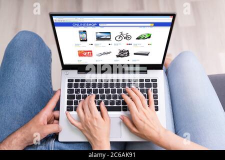 Couple Shopping Electronics Online In Ecommerce Shop Stock Photo
