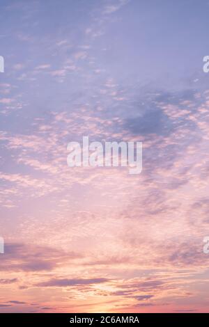 Dramatic cloudy pastel colored sunset sky. Natural background Stock Photo