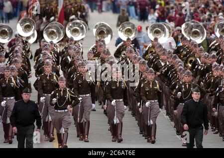 Austin, Texas USA, November 26 2004: Students from the Texas A&M University Corps of Cadets and Fightin' Texas Aggie Band march up Congress Avenue in the traditional parade before the A&M-University of Texas college football game. ©Bob Daemmrich Stock Photo