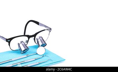 Dentist Appointment Concept in Dental Office Professional Instruments Isolated on White Background Stock Photo