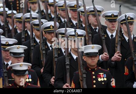 Fredericksburg, Texas USA, February 19 2005: Active duty members of the United States Navy and Marines march in a parade  commemorating the 60th anniversary of the World War II battle for Iwo Jima in the south Pacific, a key to winning the war against Japan. ©Bob Daemmrich Stock Photo