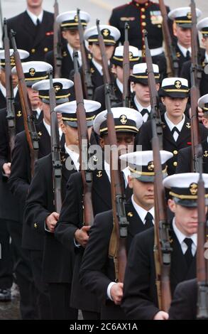 Fredericksburg, Texas USA, February 19 2005: Active duty members of the United States Navy march in a parade  commemorating the 60th anniversary of the World War II battle for Iwo Jima in the south Pacific, a key to winning the war against Japan. ©Bob Daemmrich Stock Photo
