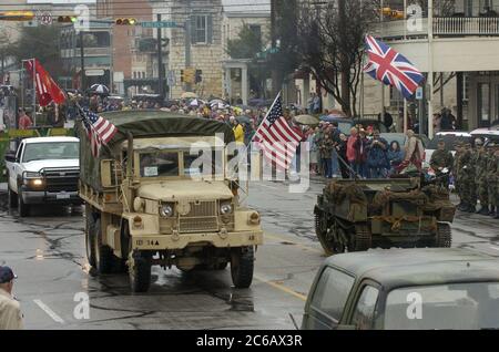 Fredericksburg, Texas USA, February 19 2005: Parade of World War II-era military vehicles highlights the 60th anniversary commemoration of the battle for Iwo Jima in the south Pacific, a key to winning the war against Japan. ©Bob Daemmrich Stock Photo