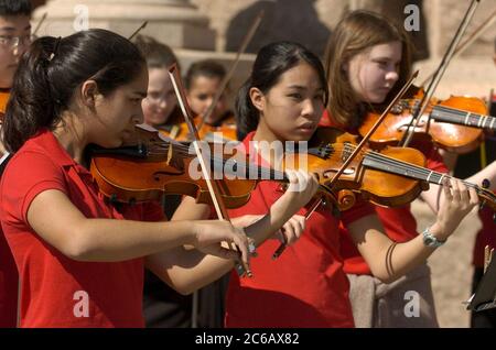 Austin, Texas USA, February 28 2005: Members of the Chisolm Trail Middle School Honor Orchestra of Round Rock, TX perform at the Texas Capitol in support of more arts education funding for Texas public schools.  ©Bob Daemmrich Stock Photo