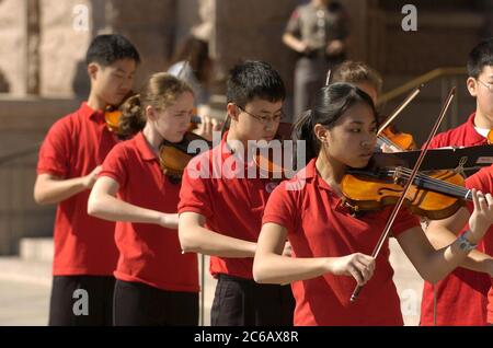 Austin, Texas USA, February 28 2005: Members of the Chisolm Trail Middle School Honor Orchestra of Round Rock, TX perform at the Texas Capitol in support of more arts education funding for Texas public schools.  ©Bob Daemmrich Stock Photo