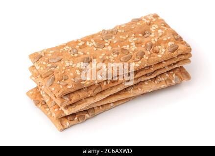 Stack of crispbread with sesame and sunflower seeds isolated on white Stock Photo