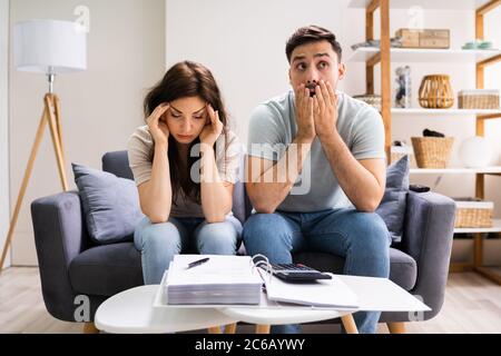 Family In Financial Trouble Having Stress Over Debt And Money Stock Photo