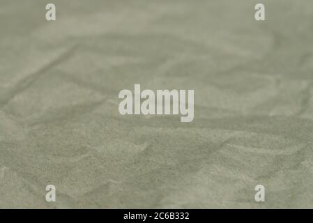 creased green paper background texture selective focus Stock Photo