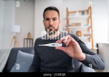 Digital thermometer showing high temperature Stock Photo - Alamy