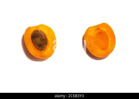 Top view of apricot halves isolated on white background Stock Photo