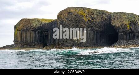 Basalt rock cliffs and sea cave; Fingal's Cave, Staffa, Isle of Mull, Inner Hebrides, Scotland, UK