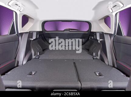 car trunk with rear seats folded Stock Photo