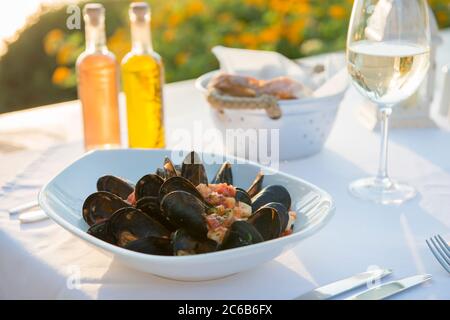 Mussels with white wine at a restaurant in Pefkos, Rhodes, Dodecanese, Greek Islands, Greece, Europe Stock Photo