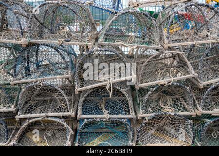 Stacked lobster and crab traps on a dock in Redondela, Galicia, Spain Stock Photo