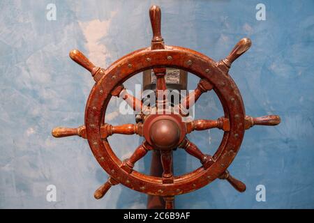Old wooden ship helm on display at the Museo do Mar de Galicia - sea maritime museum in VIgo, Galicia, Spain, Europe Stock Photo