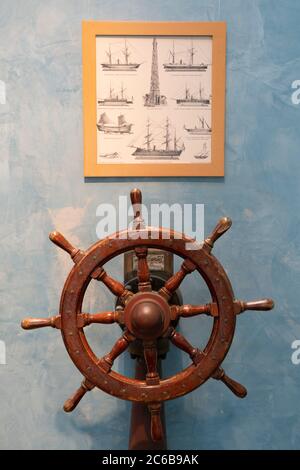 Old wooden ship helm on display at the Museo do Mar de Galicia - sea maritime museum in VIgo, Galicia, Spain, Europe Stock Photo