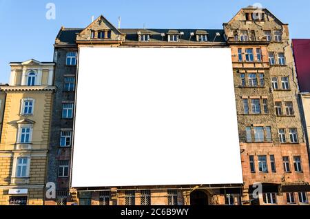 Large blank billboard on an old building Stock Photo