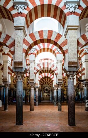 The red and white stone Arches of Mezquita de Cordoba (Great Mosque) (Cordoba Cathedral), UNESCO World Heritage Site, Cordoba, Andalusia, Spain, Europ Stock Photo