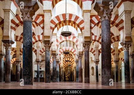 The red and white stone Arches of Mezquita de Cordoba (Great Mosque) (Cordoba Cathedral), UNESCO World Heritage Site, Cordoba, Andalusia, Spain, Europ Stock Photo