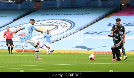 Manchester City's Riyad Mahrez scores his side's second goal of the game during the Premier League match at the Etihad Stadium, Manchester. Stock Photo