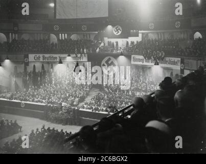 Rally in the Sportpalast Berlin Heinrich Hoffmann Photographs 1934 Adolf Hitler's official photographer, and a Nazi politician and publisher, who was a member of Hitler's intimate circle. Stock Photo