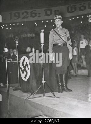 Rally in the Berlin Sportpalast - Heinrich Hoffmann Photographs 1934 Adolf Hitler's official photographer, and a Nazi politician and publisher, who was a member of Hitler's intimate circle. Stock Photo